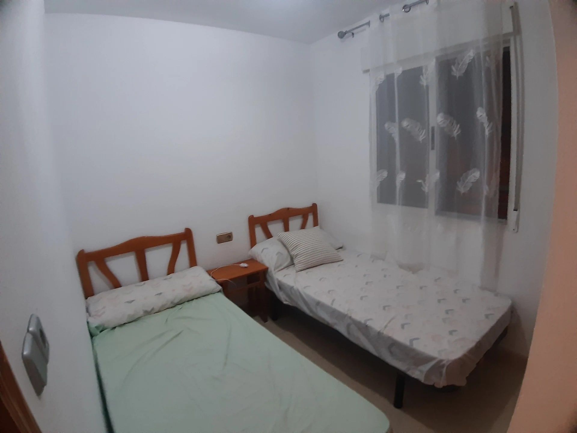 Dormitorio con dos camas en Mar 16